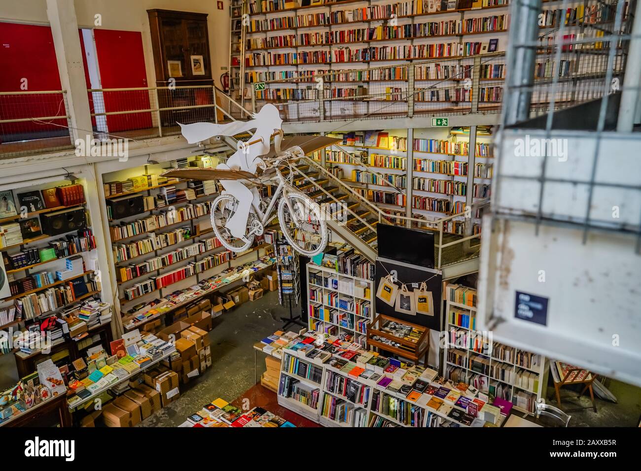 Ler Devagar is a former newspaper print workshop, now converted to a bookstore in LX factory in Lisbon Portugal. Its motto means read slowly. Stock Photo