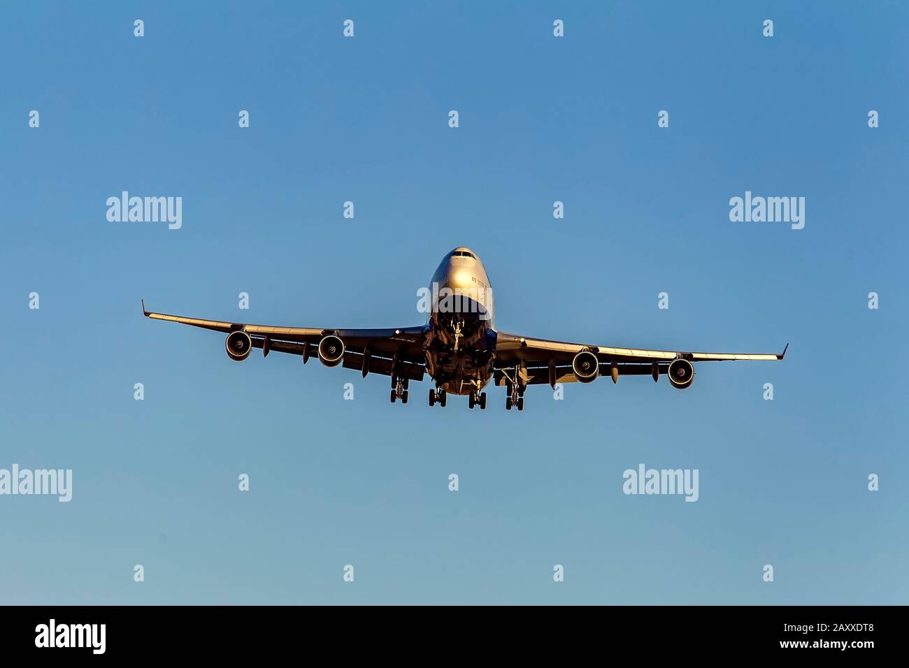 A jumbo jet coming in for a landing. Stock Photo