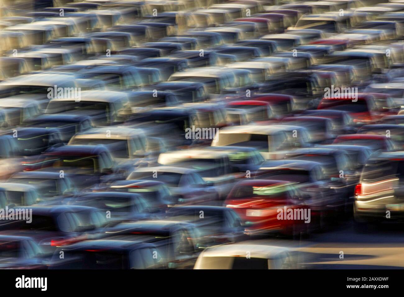 Special effect of a deluge of commuters in a traffic jam. Stock Photo