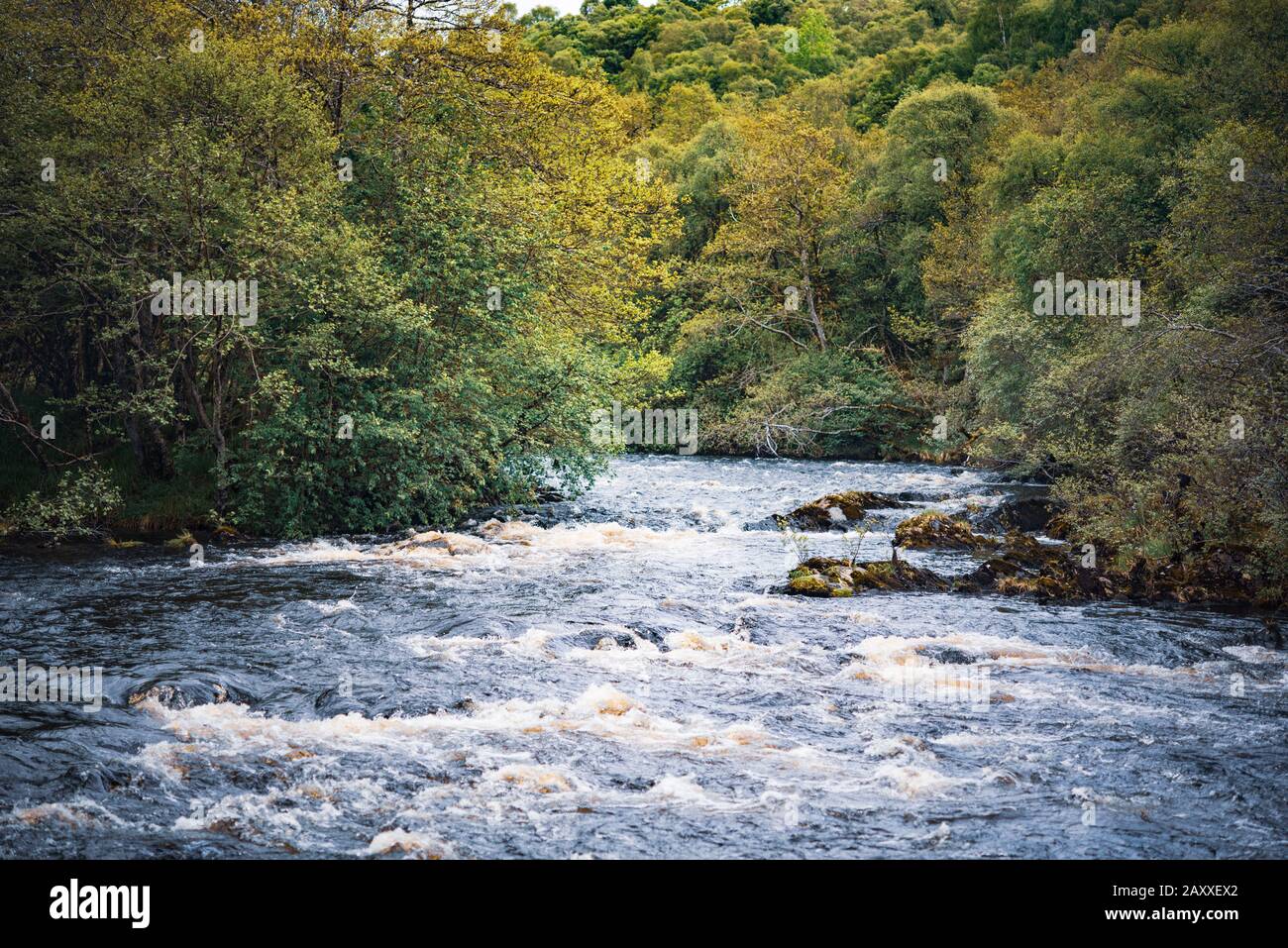 Flowing river at Shin Glen in Lairg, just before the Shin falls Stock Photo