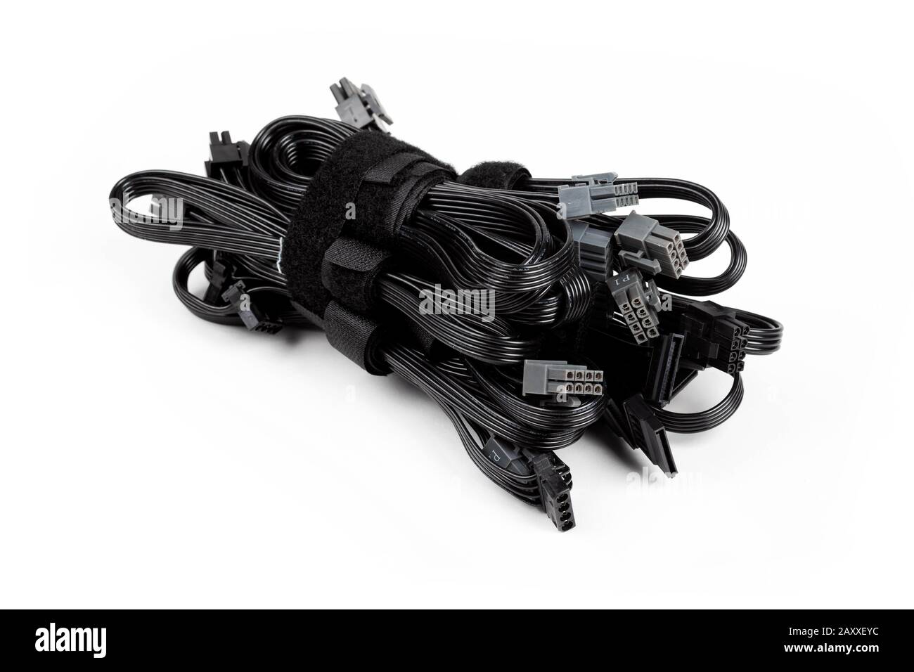 Black modular power supply unit cables set, psu cords put together isolated on white. Many power cables, modern pc assembly parts. Cable management Stock Photo
