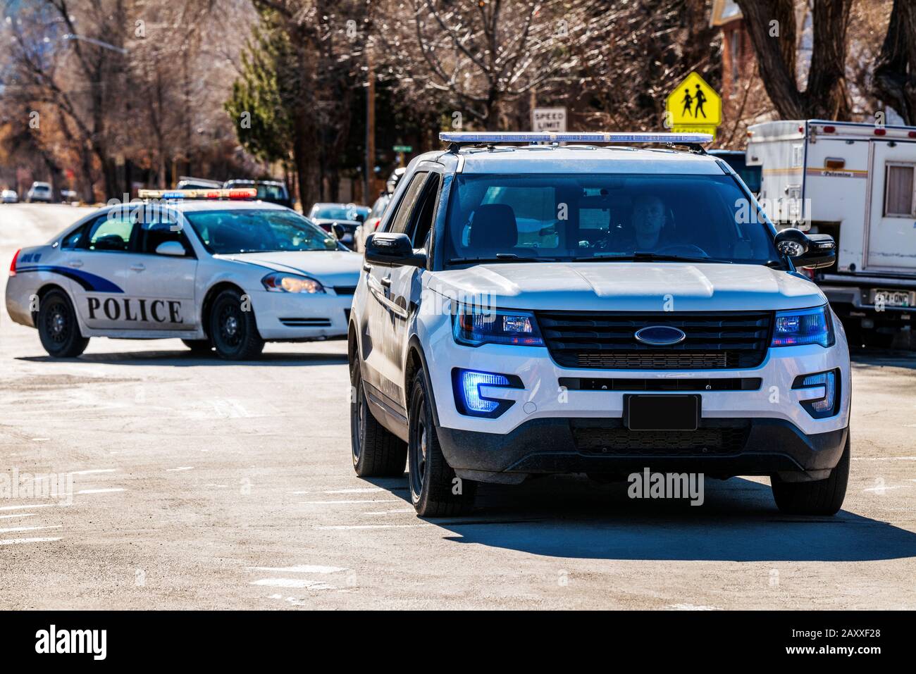 Police car & lights; escort a parade in small town of Salida; Colorado; USA Stock Photo