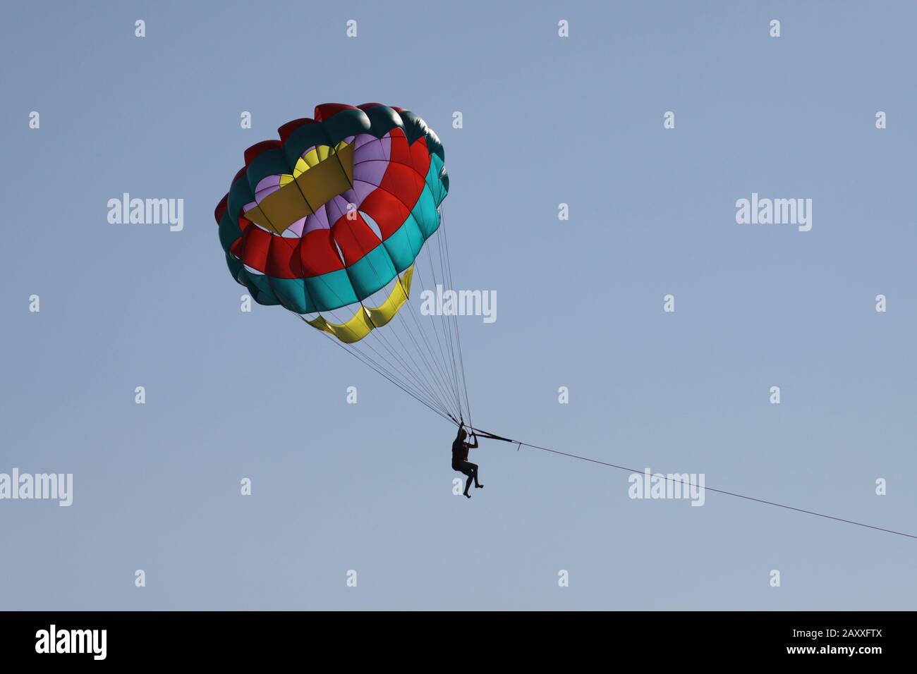Parachute jumpingsailing above the sea Stock Photo Alamy