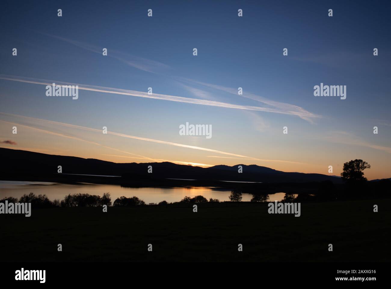 Sunset over loch Shin, West Sninness Stock Photo
