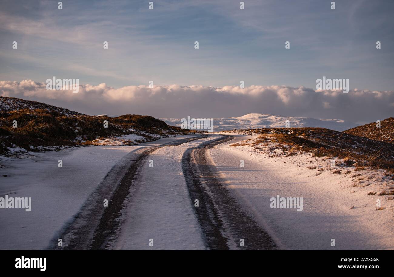 Unnamed road near Loch Meadie covered in snow and ice Stock Photo