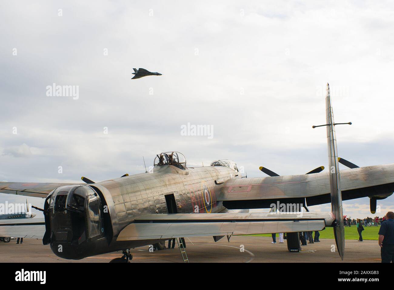 A rare survivor of WWII a ex-RAF Lancaster bomber at a public Air Show at Kemble in Gloucestershire with an equally rare AVRO Vulcan jet bomber from nh Stock Photo