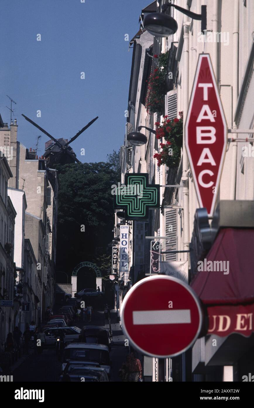 PARIS RUE THOLOZÉ VIEW WITH MOULIN DE LA GALETTE AT THE TOP OF THE STREET - PARIS MONTMARTRE - PARIS STREET VIEW - COLOR SLIDE © Frédéric BEAUMONT Stock Photo