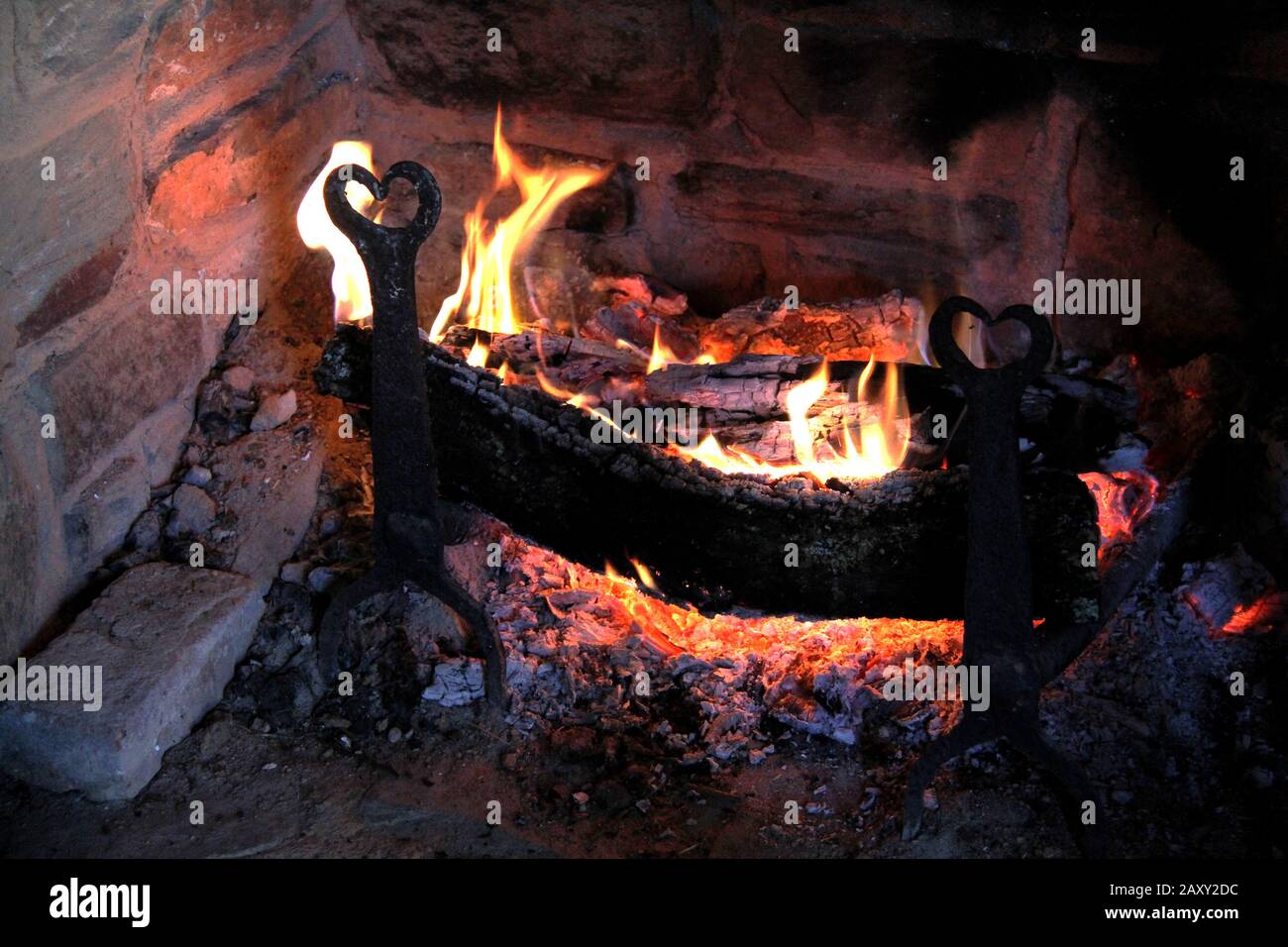 Burning wood logs in fireplace Stock Photo Alamy