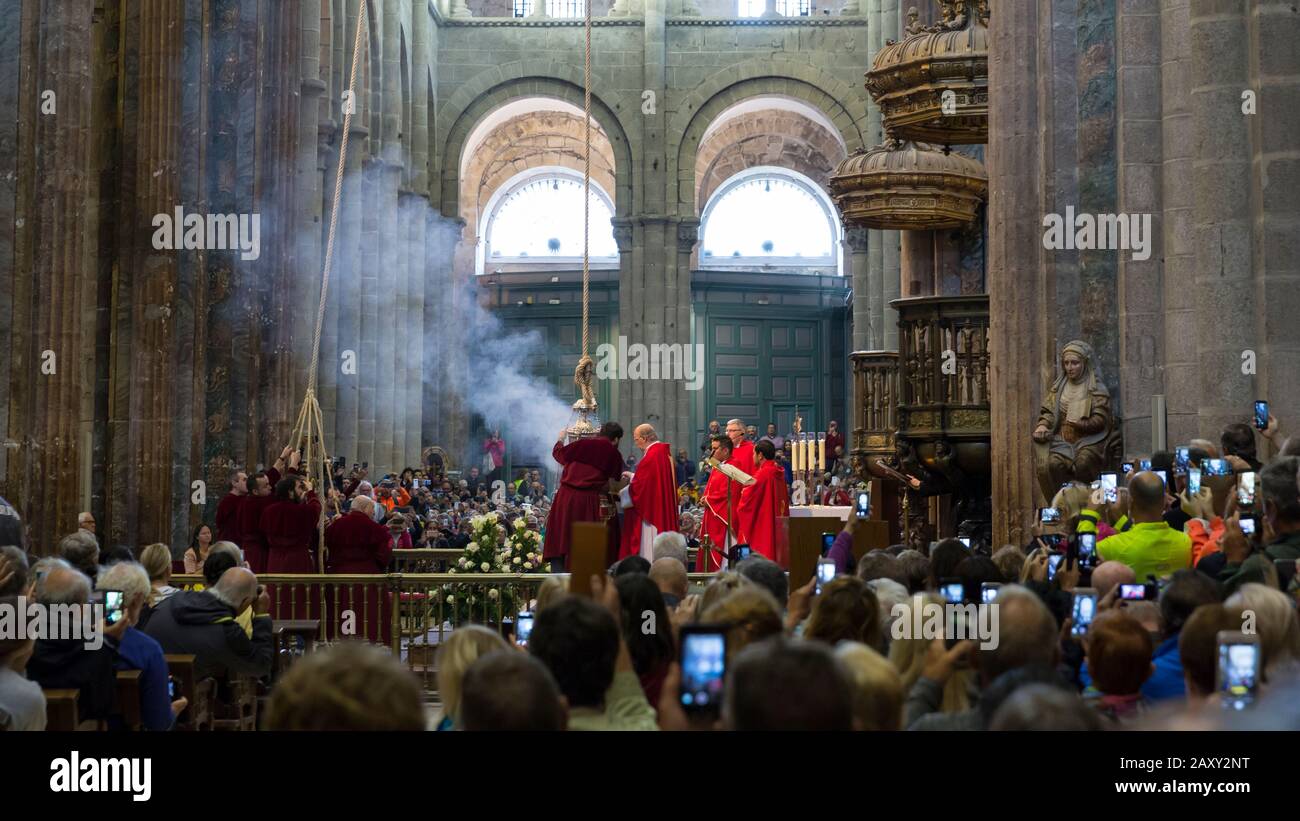 A Priest Lights The Botafumeiro During The Traditional Pilgrims Mass At The Cathedral In Santiago De Compostela Spain The Famous Silver Thurible Is Stock Photo Alamy A Priest Lights The Botafumeiro During The Traditional Pilgrims Mass At The Cathedral In Santiago De Compostela Spain The Famous Silver Thurible Is Stock Photo Alamy