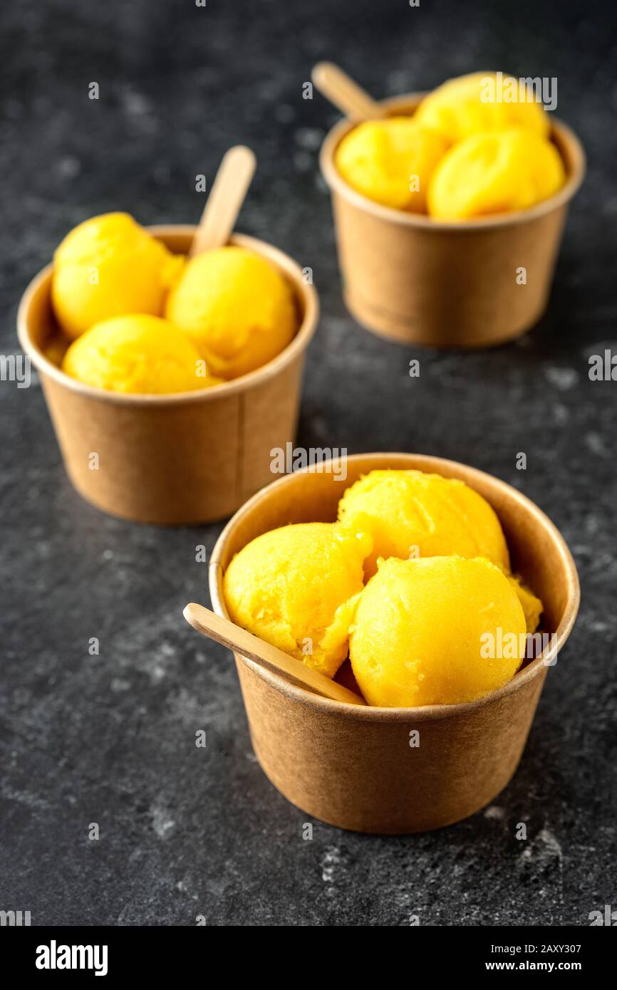 Download Scoops Of Yellow Ice Cream In Organic Paper Cups Stock Photo Alamy Yellowimages Mockups
