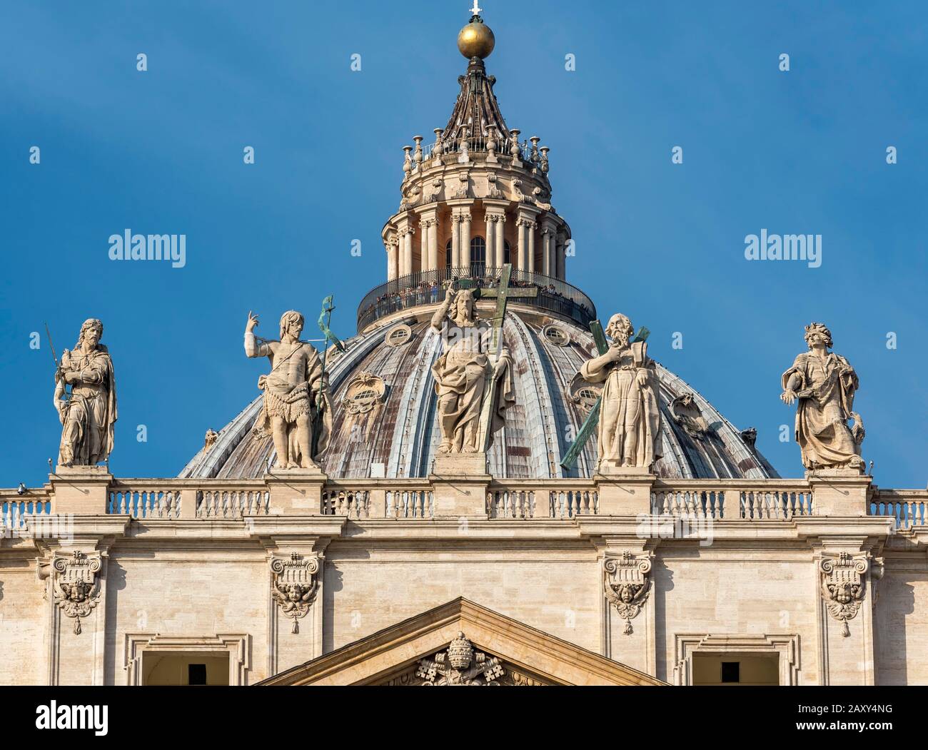Cupola of St. Peter's Basilica with statues of Saints James, John the