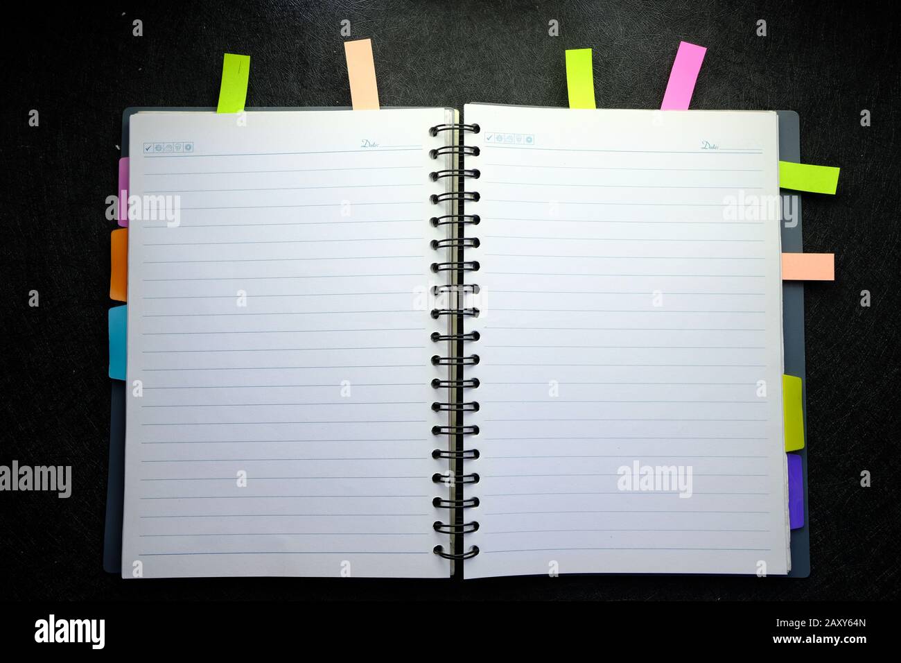 top view of open notepad on black background Stock Photo