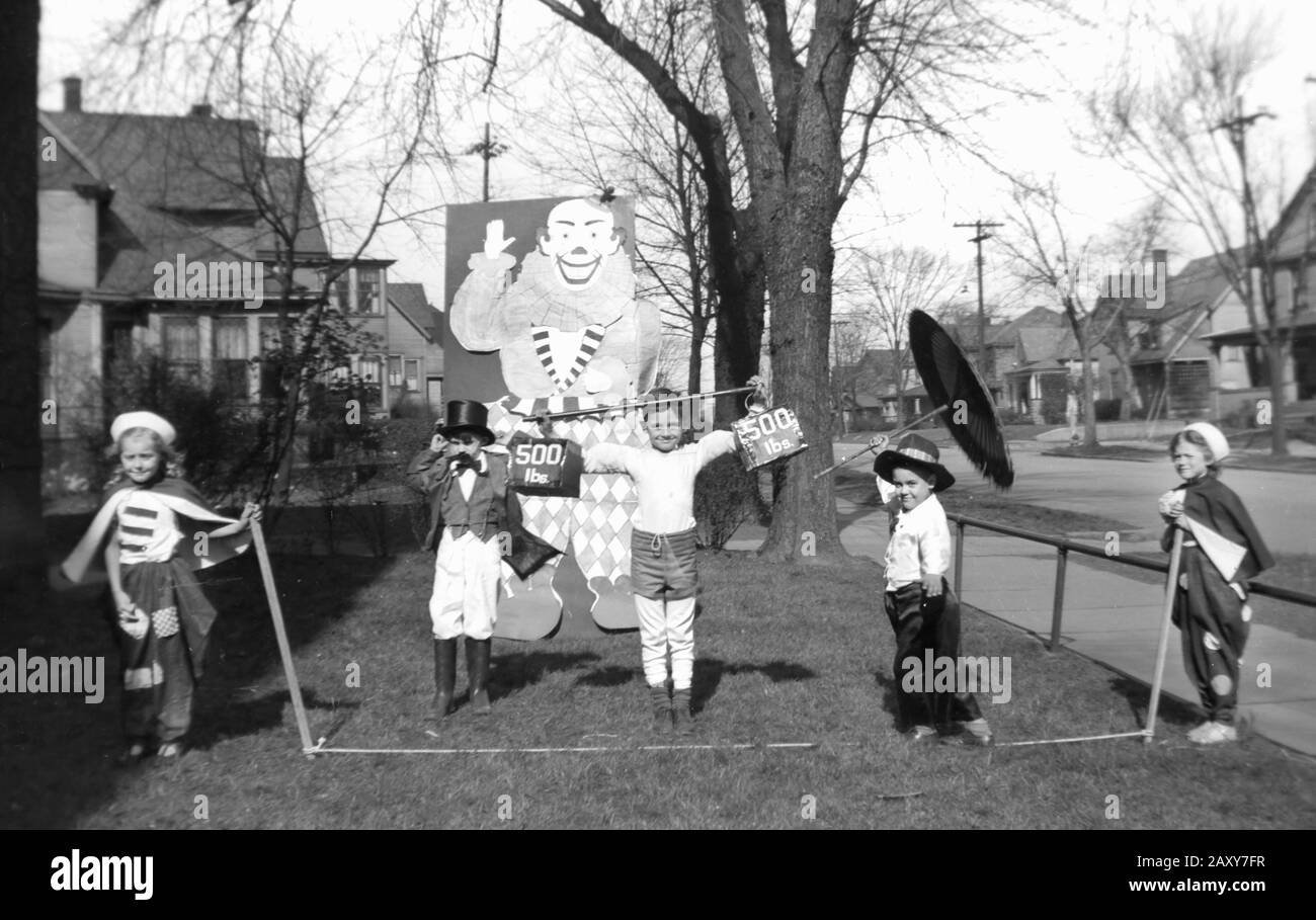 Neighborhood children play pretend circus in their front yard in Chicago, ca. 1935. Stock Photo