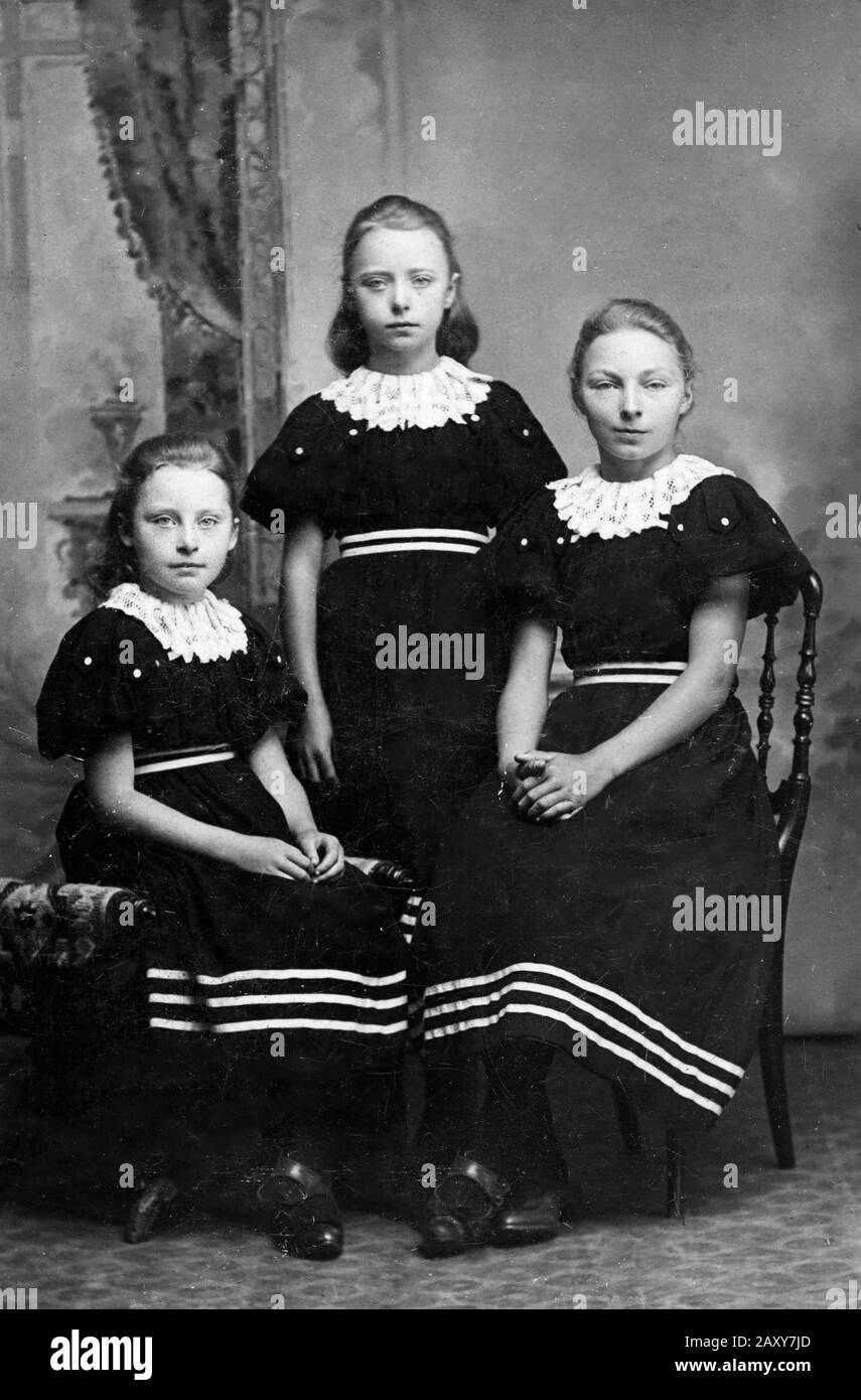 Sisters pose in a tintype portrait, ca. 1880. Stock Photo