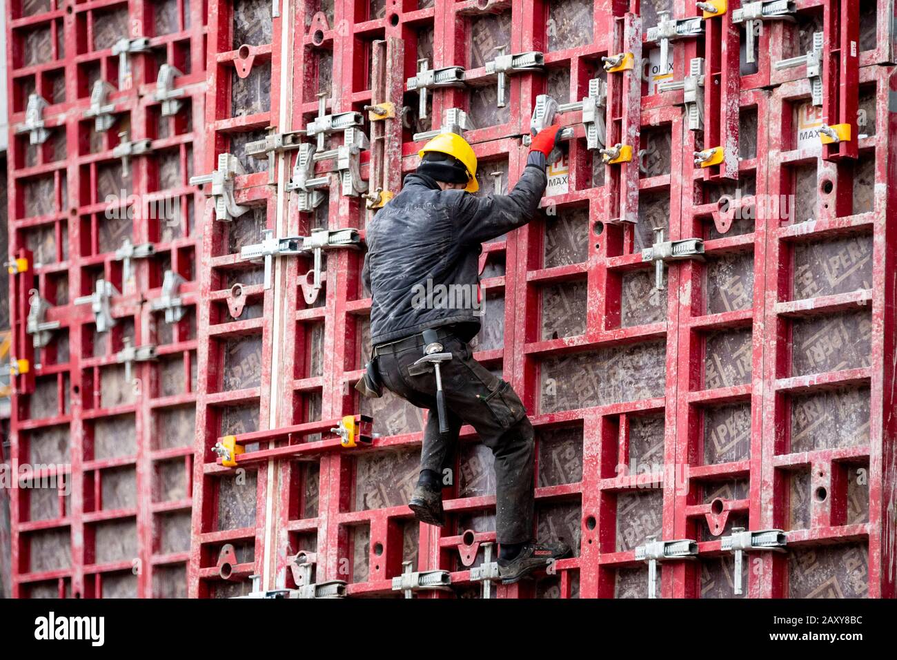 Berlin, Germany. 12th Feb, 2020. A construction worker works on a ...