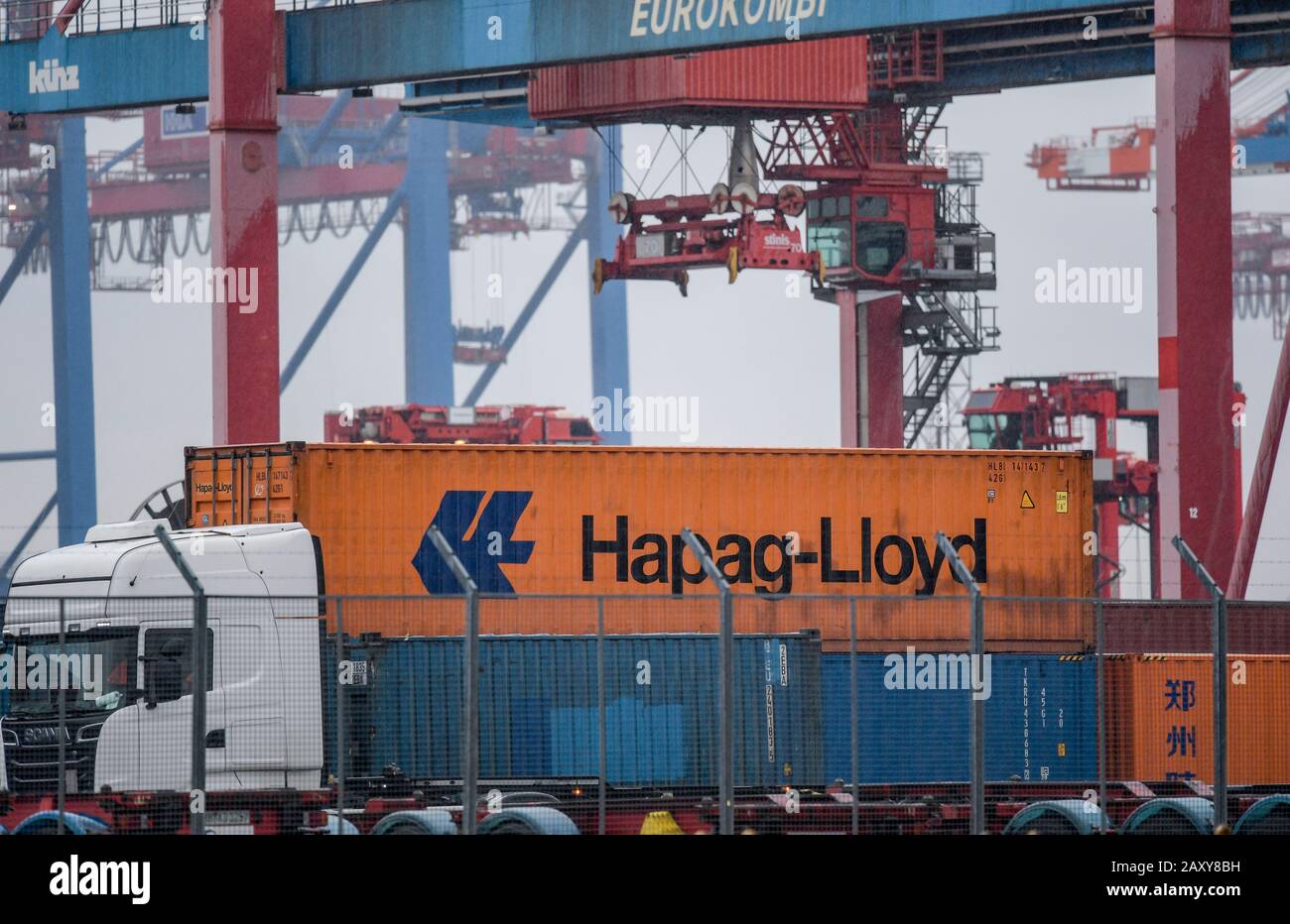 Hamburg, Germany. 13th Feb, Containers from various shipping companies are handled in the port of Hamburg. Credit: Axel Heimken/dpa/Alamy Live News Stock Photo Alamy