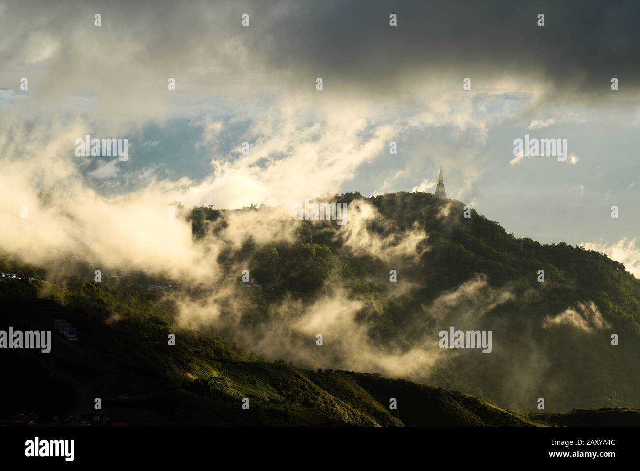 View of Wat Pa Phu Thap Boek from Phu Thap Boek mountain in the morning covered in clouds, Dan Sai district, Thailand Stock Photo
