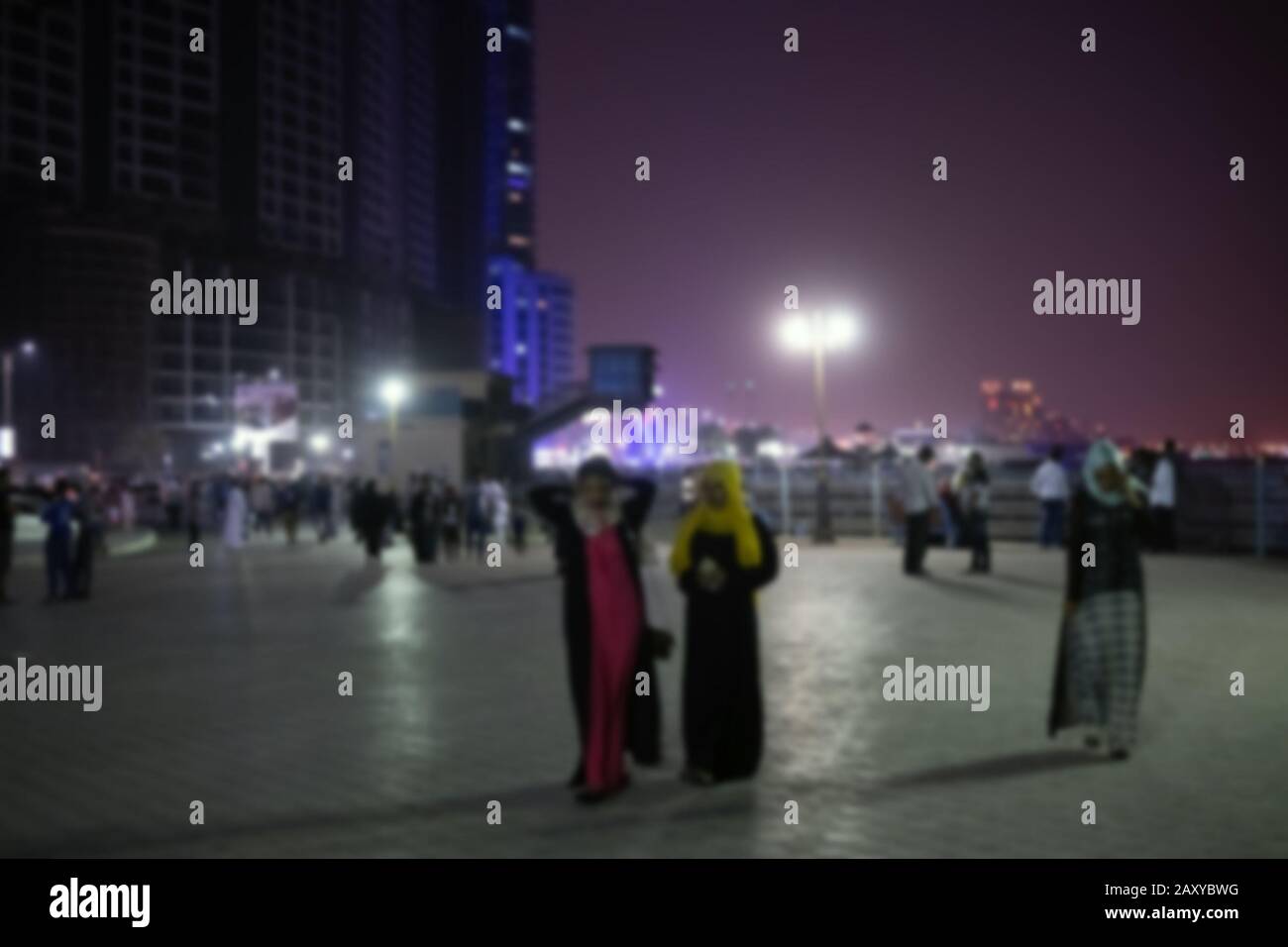 People on Street Sheikh Humaida bin Rashid al-Nuaimi in Ajman, UAE. Bluer background Stock Photo
