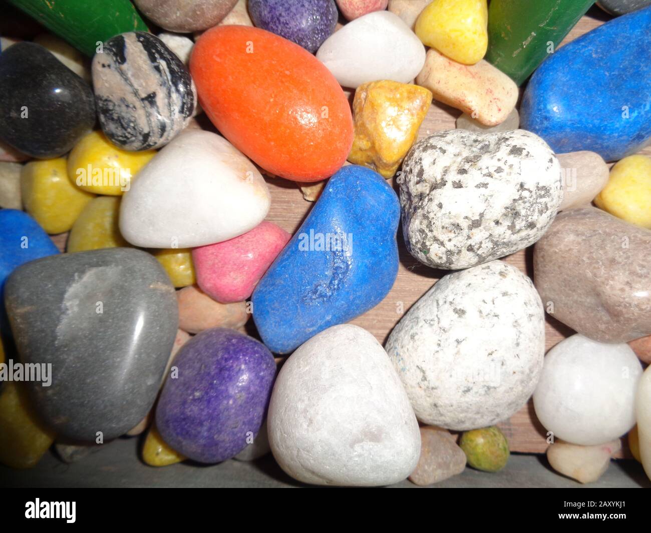 Multiple colourful stones on the floor Stock Photo