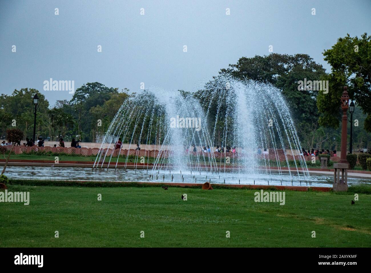 Water Fountain in the park flowing water Stock Photo