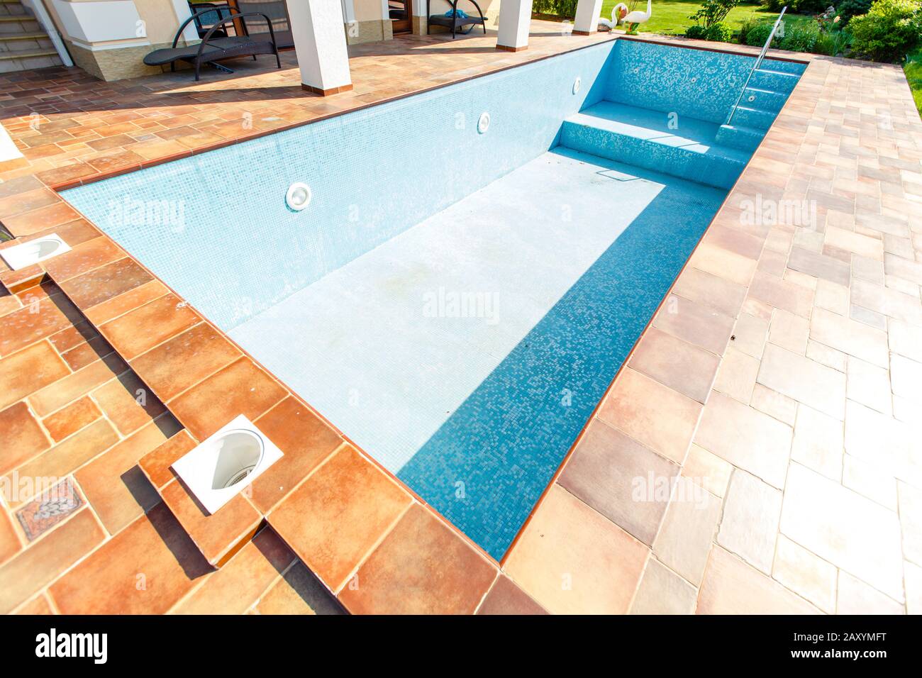 Pool without water in the backyard of the cottage Stock Photo Alamy