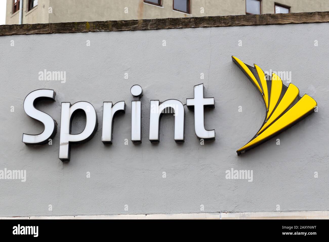 A Sprint logo on a wall at a store in New York, NY Stock Photo
