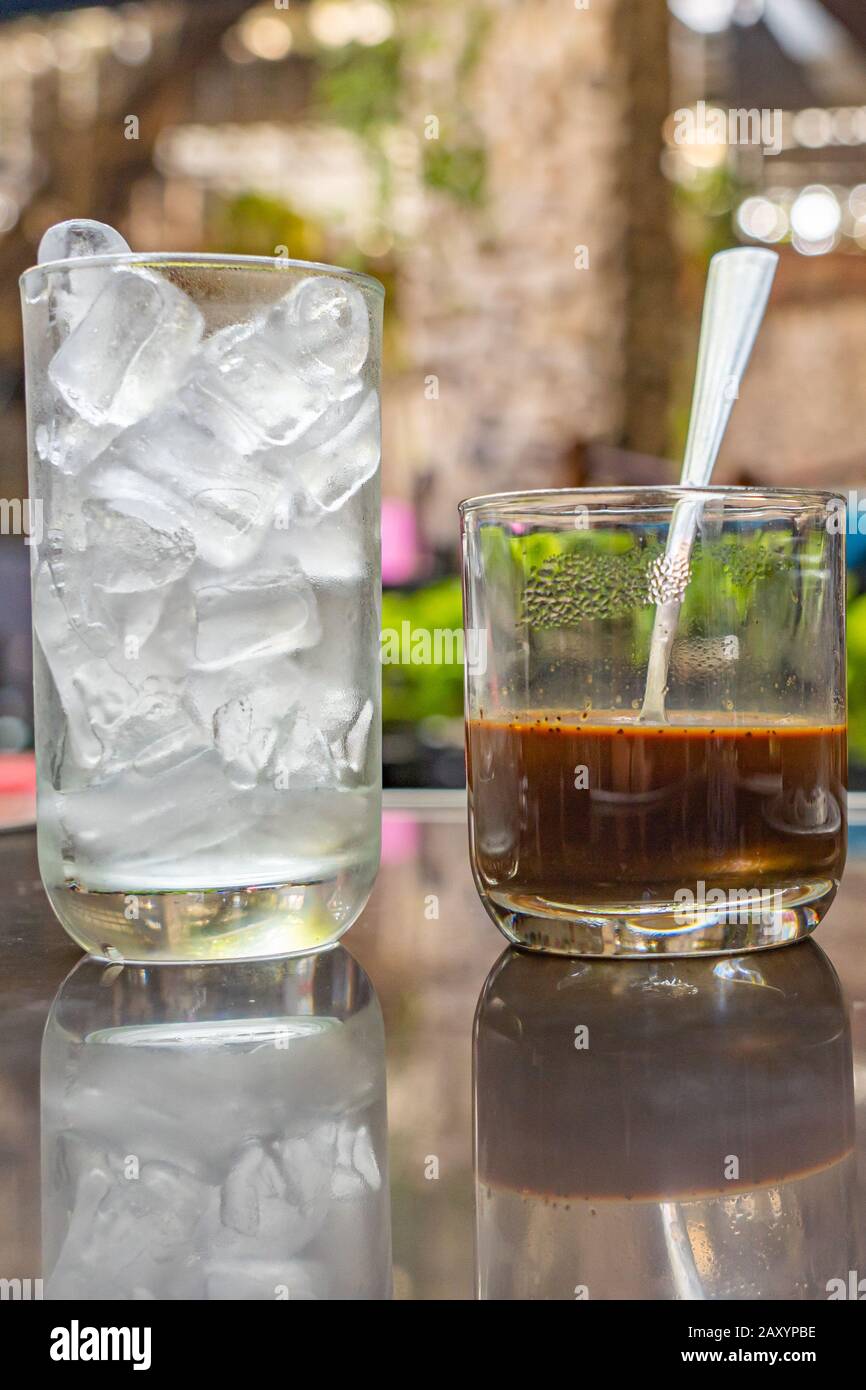 Traditional Vietnamese condensed milk coffee served with ice Stock