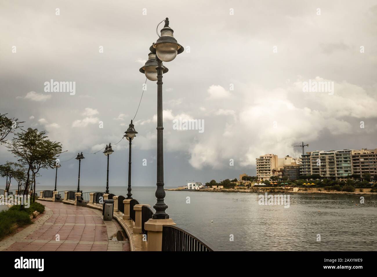 Street lanterns on promenade in Sliema, Malta Stock Photo