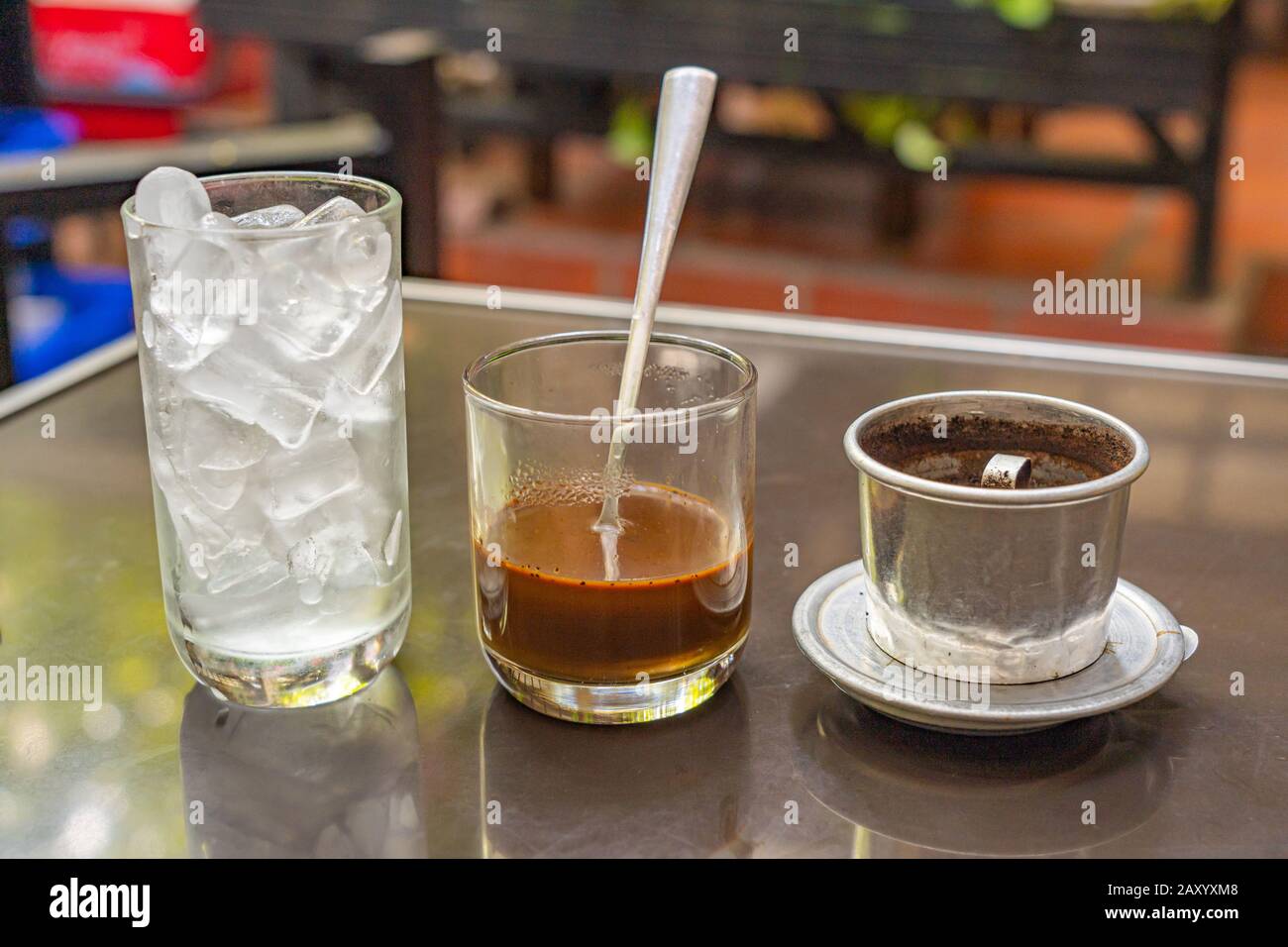 Traditional brewed Vietnamese coffee mixed with condensed milk Stock