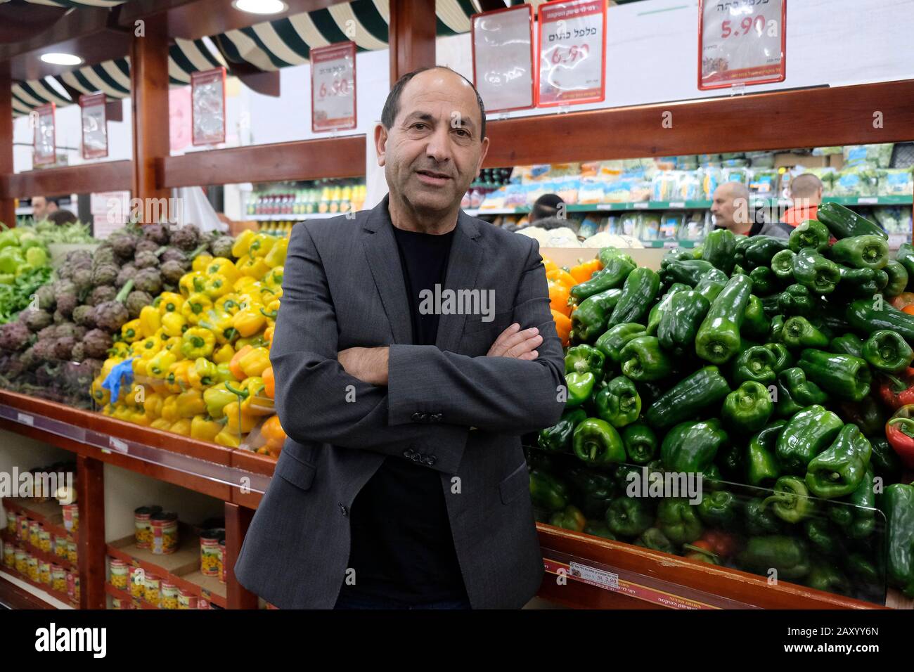 Rami Levy owner of Rami Levy Hashikma Marketing an Israeli retail  supermarket chain that operates throughout Israel, including the West Bank  posing in a branch of Ramy Levy supermarket in Atarot industrial