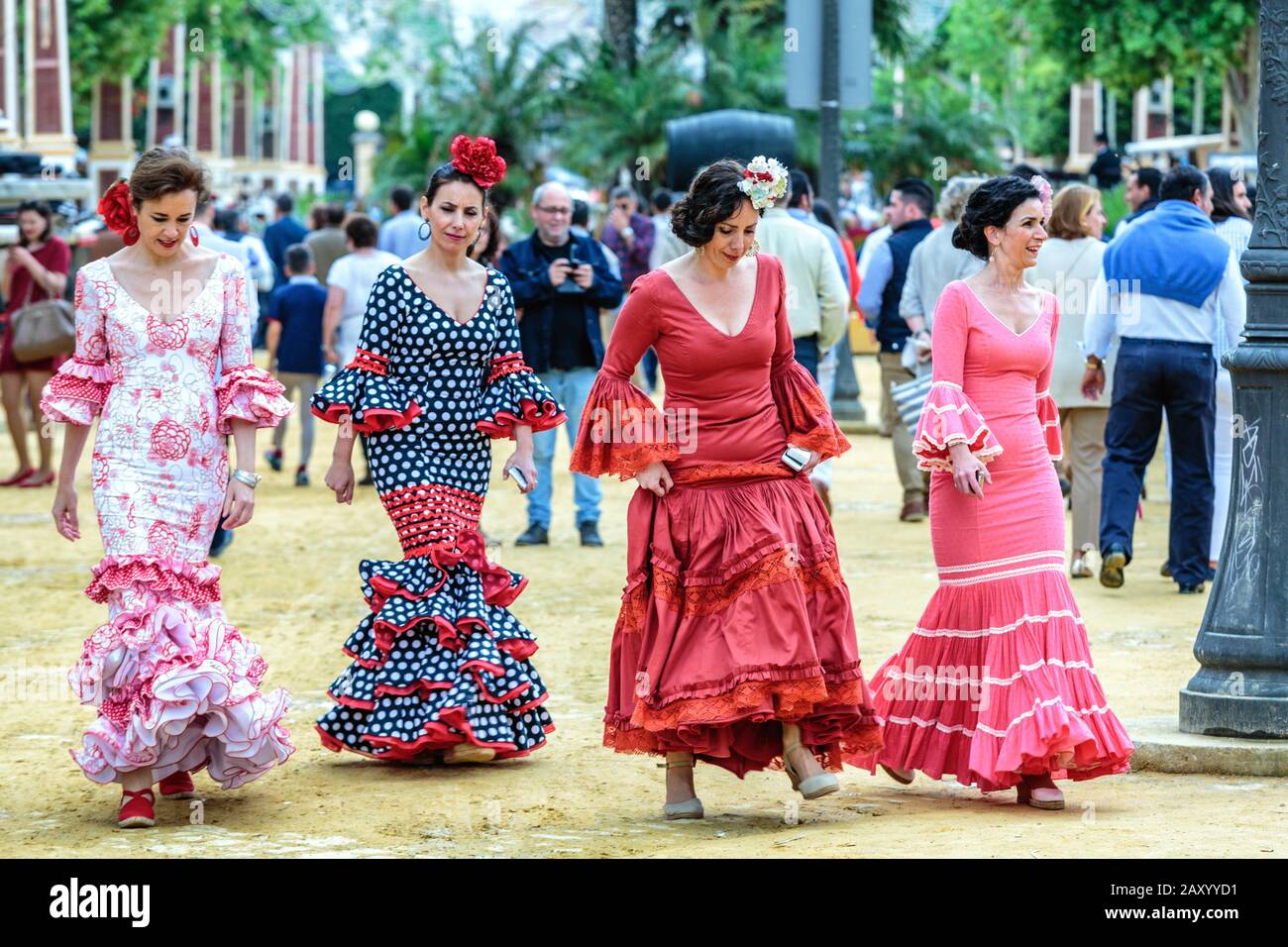 Women wearing traditional Spanish flamenco dresses, Jerez Horse Fair (Feria de Caballo) , Jerez de la Frontera, Andalusia, Spain Stock Photo