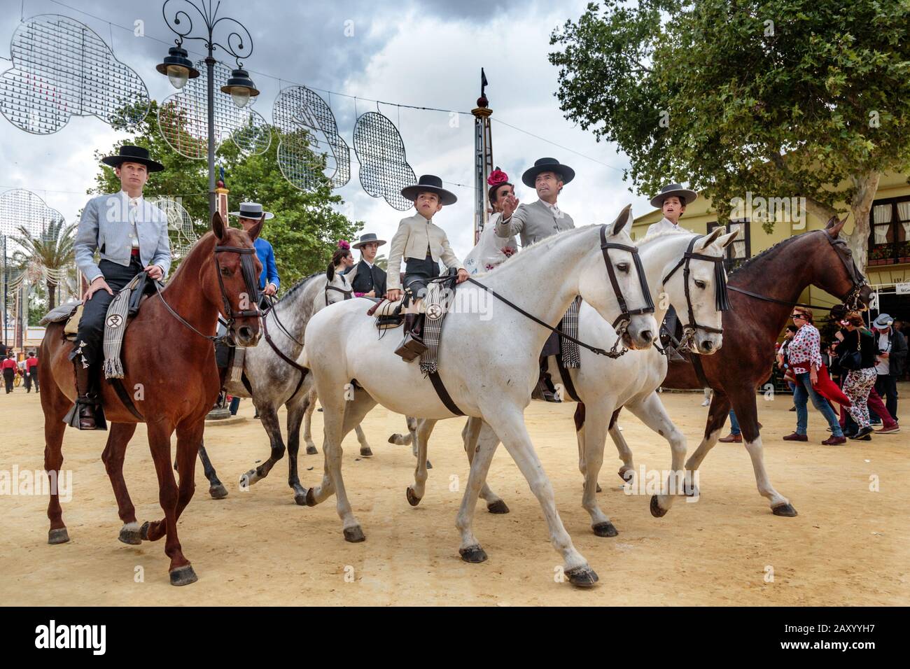 Riders and horses in traditional festive dress, Jerez Horse Fair (Feria de Caballo) , Jerez de la Frontera, Cádiz Province, Andalusia, Spain Stock Photo