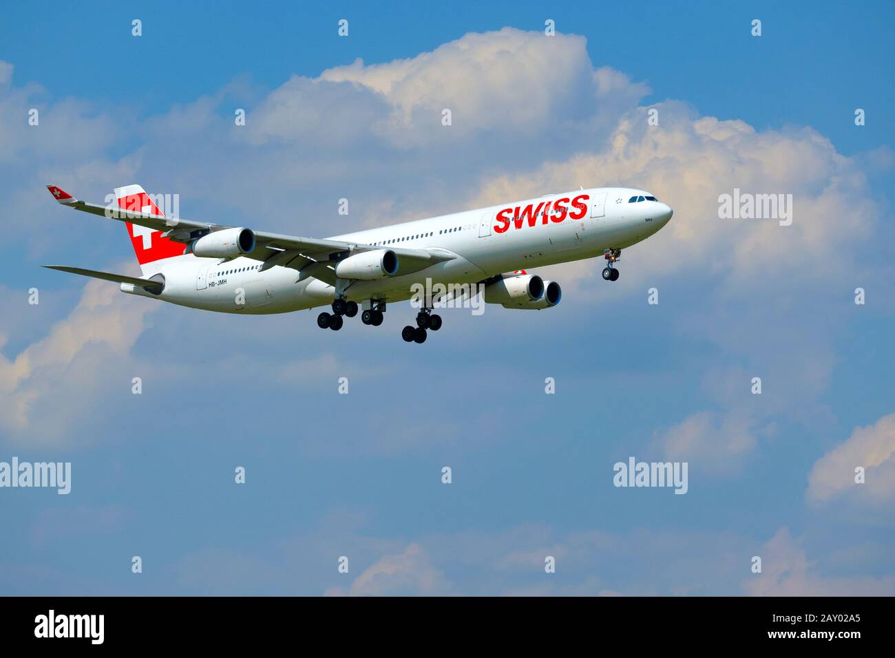 Swiss airlines airplane preparing for landing at day time in ...