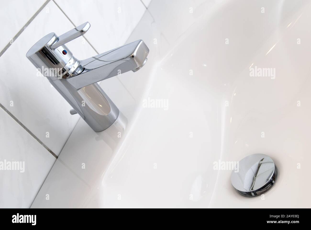Water tap and washbasin Stock Photo