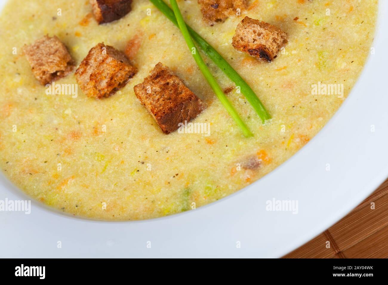 Potato soup with croutons and chives Stock Photo