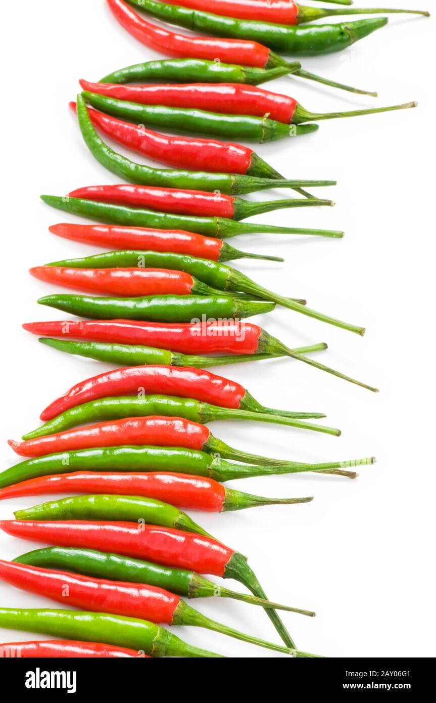 Red and green chili peppers isolated on the white Stock Photo - Alamy