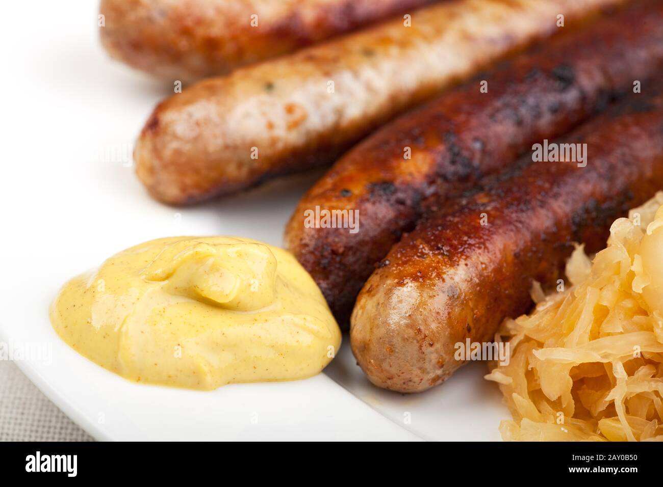 Bratwurst, mustard and sauerkraut Stock Photo Alamy