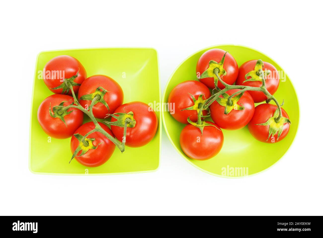 Red tomatoes isolated on the white background Stock Photo - Alamy