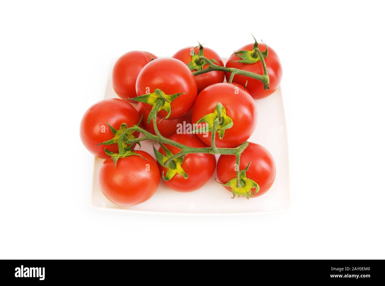 Red tomatoes isolated on the white background Stock Photo - Alamy