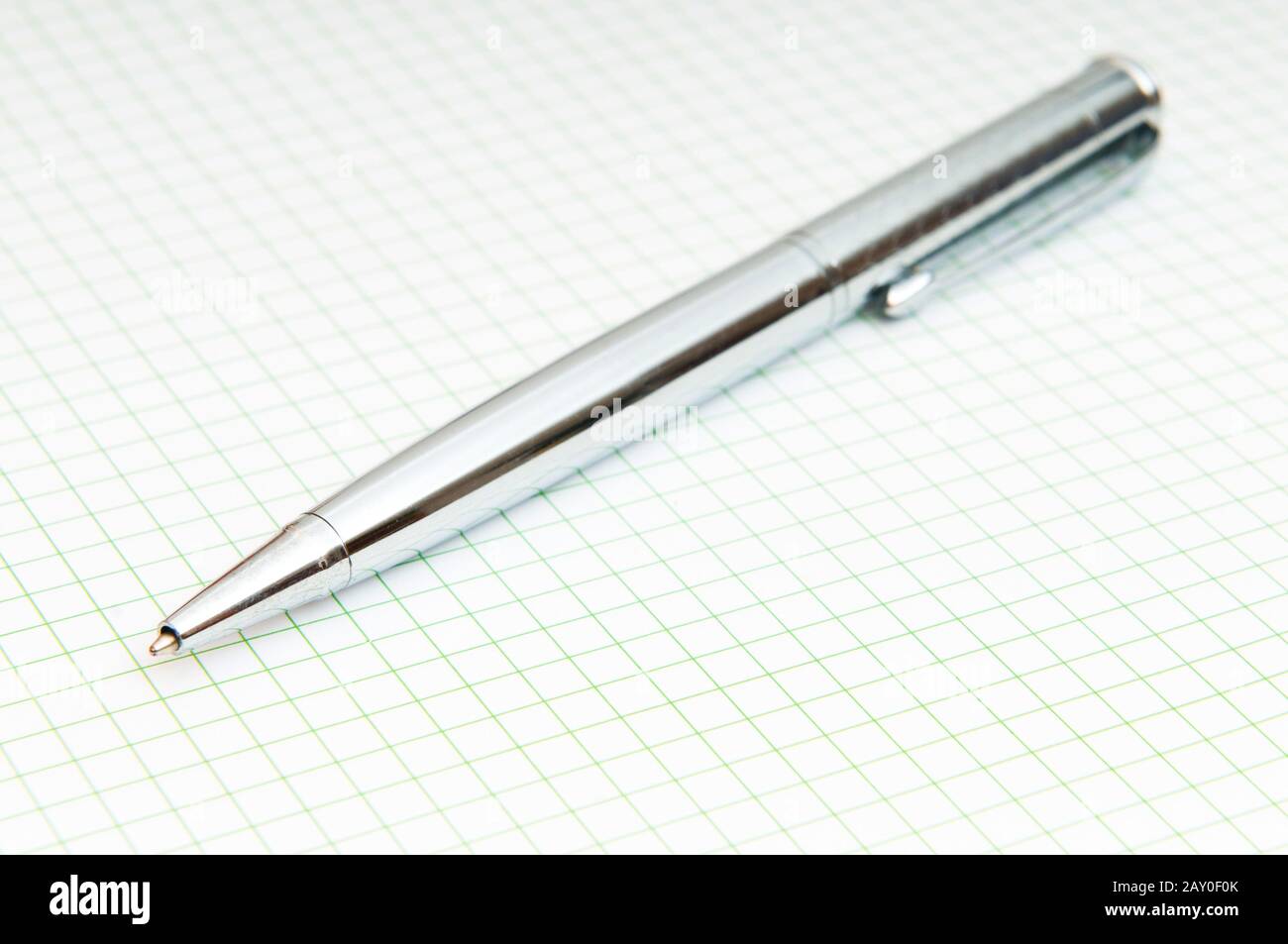 Writing pen on the blank page Stock Photo - Alamy