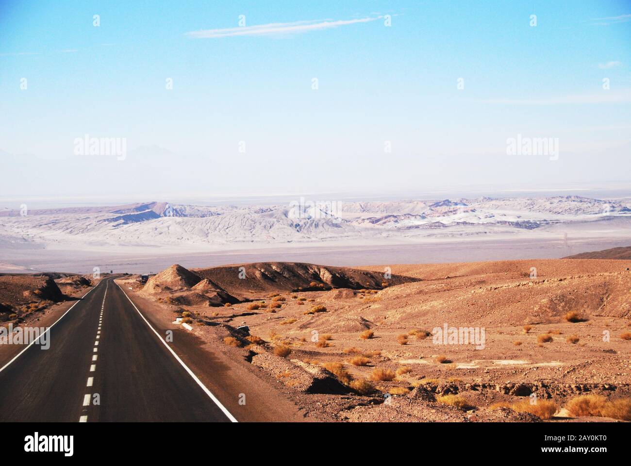 Straight road through the Atacama Desert near Arica, Chile Stock Photo