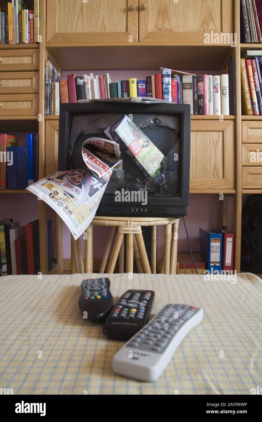 Broken television in a living room Stock Photo