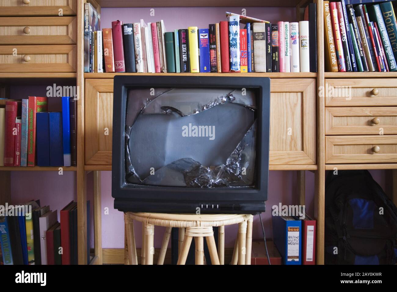 Broken television in a living room Stock Photo