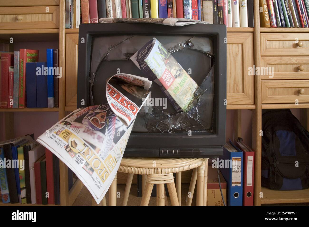 Broken television in a living room Stock Photo