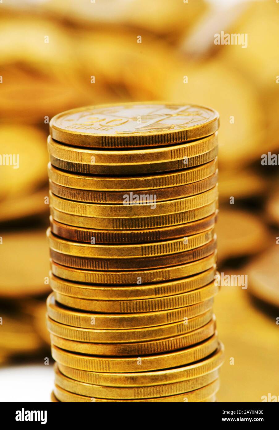 Stack of golden coins isolated on white Stock Photo - Alamy