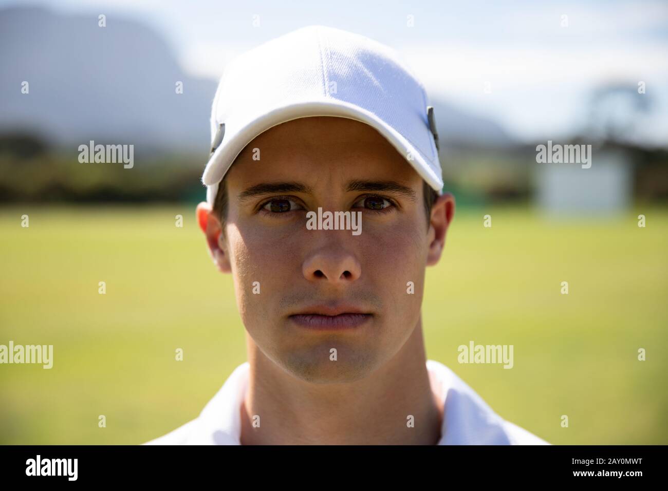 Cricket player looking at the camera Stock Photo