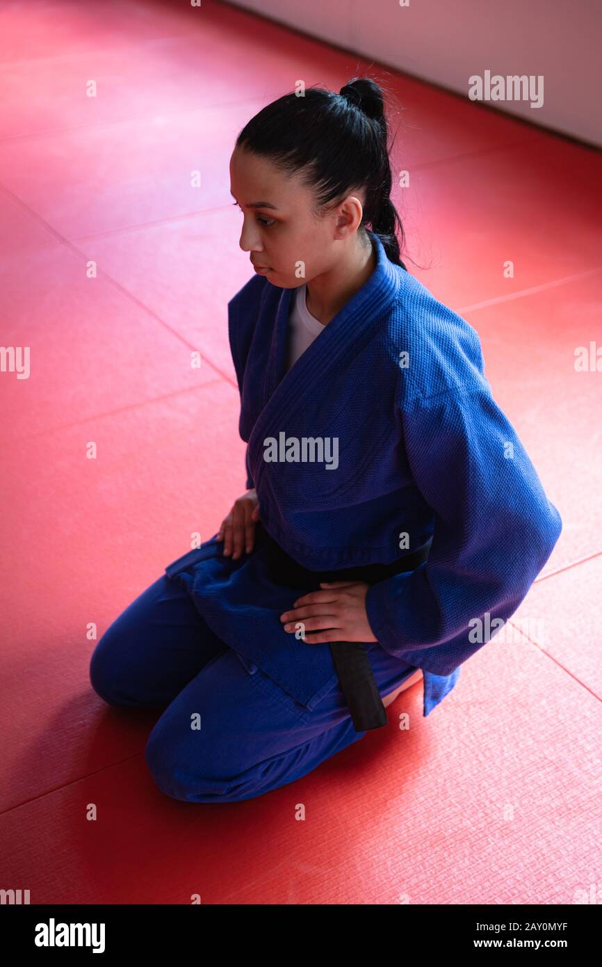 Judoka kneeling on mats in the gym before judo training Stock Photo Alamy