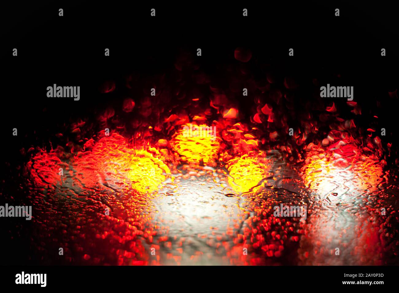 blurry RÃ¼cklichter in the rain Stock Photo
