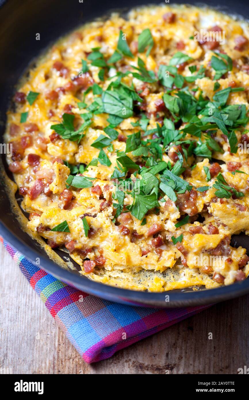 Scrambled eggs in a pan Stock Photo Alamy