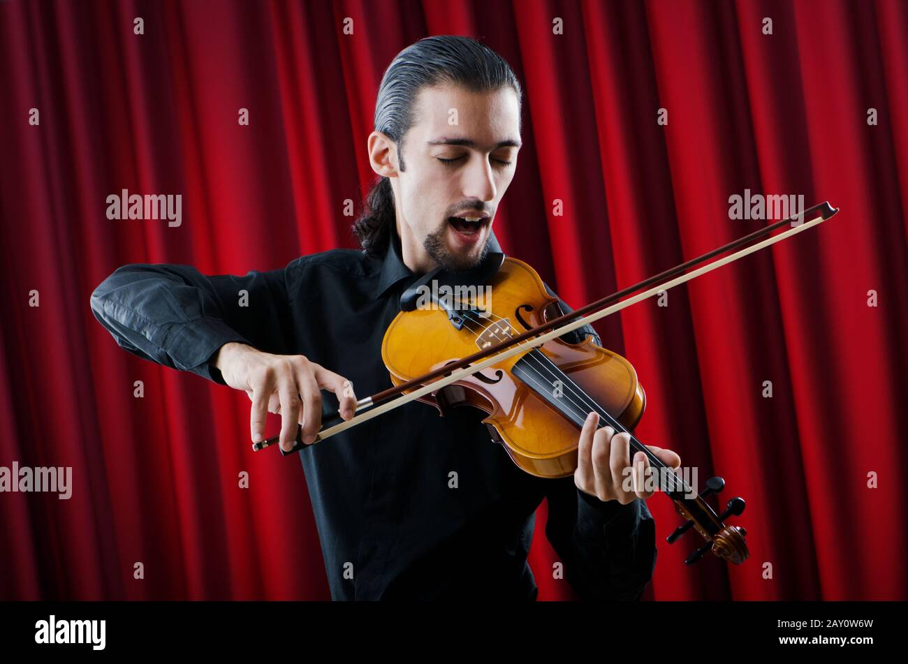 Young violin player playing Stock Photo Alamy